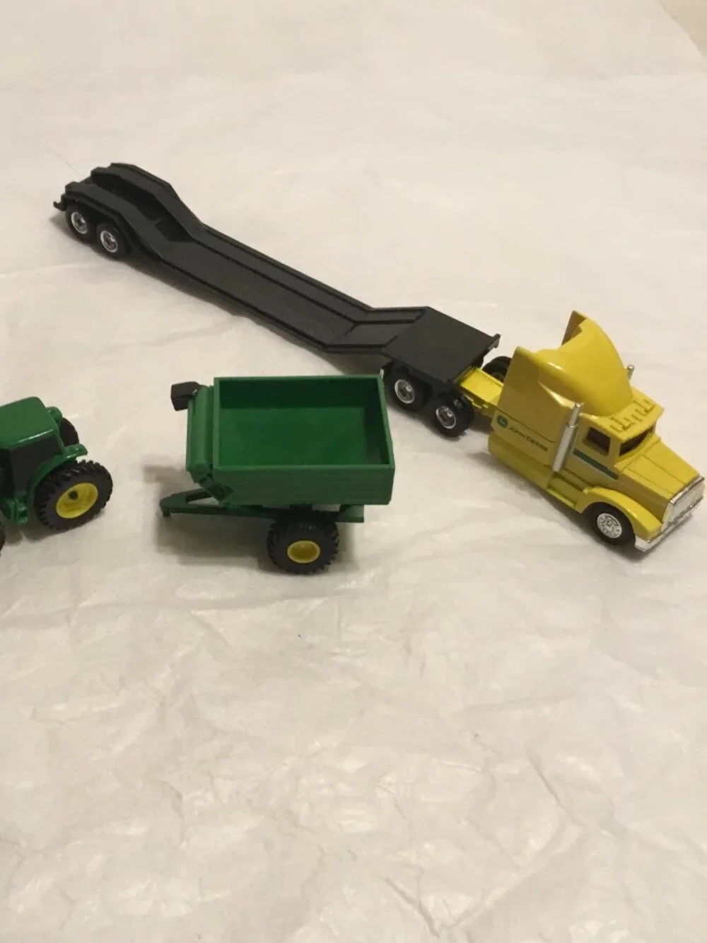 Vintage die cast John Deere tractor trailer and trailer w/ tractor and grain bin